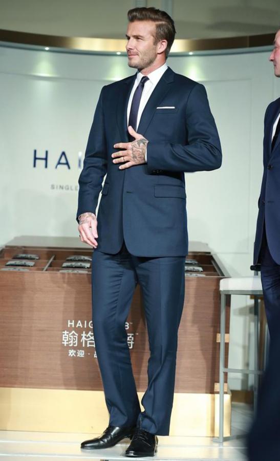 David Beckham in navy suit, with - David Beckham Gallery